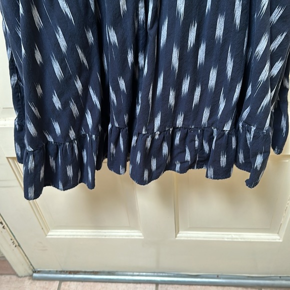 This dress has POCKETS! smocked waist, ruffled hem and flutter sleeves - Picture 6 of 6